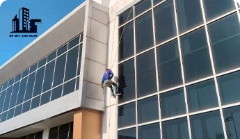 Wiping glass of tall buildings npnetandpaint