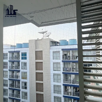 Install bird netting on the balcony of a condo in Bangkok npnetandpaint